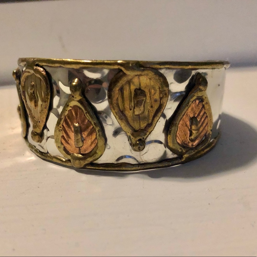 Silver bracelet with copper and bronze design